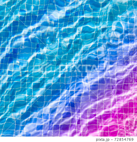 water ripples in swimming pool, blue and purple background water ripples in swimming pool, blue and purple background 72854769