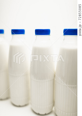 milk bottles on white table 72855085