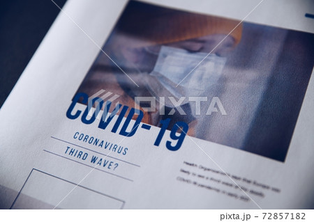 Morning newspaper with bad news about third wave Covid-19. Morning newspaper with bad news about third wave Covid-19. 72857182