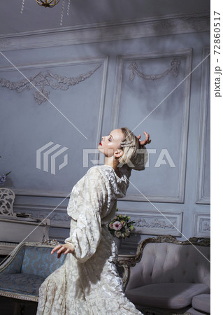 pretty blond woman in rich luxury house interior, fashion people concept pretty blond woman in rich luxury house interior, fashion people concept 72860517