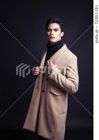handsome asian fashion looking man posing in studio on black background, lifestyle modern people concept handsome asian fashion looking man posing in studio on black background, lifestyle modern people concept 72861181