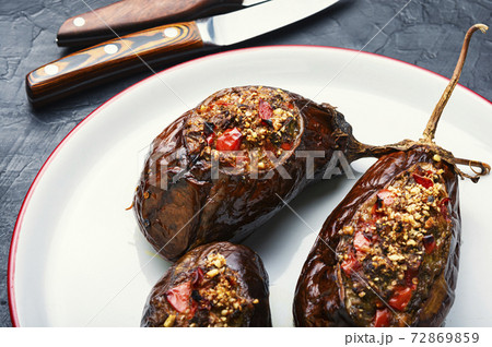 Grilled eggplant stuffed with vegetables Grilled eggplant stuffed with vegetables 72869859