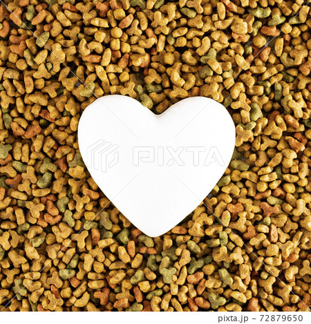 White heart on pet food, pet love concept White heart on pet food, pet love concept 72879650