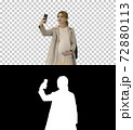 Happy young pregnant woman taking selfie, Alpha Channel with Sil 72880113