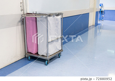 Laundry bags collect dirty used linen of patients at hospital ward Laundry bags collect dirty used linen of patients at hospital ward 72880952