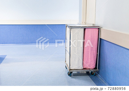 Laundry bags collect dirty used linen of patients at hospital ward Laundry bags collect dirty used linen of patients at hospital ward 72880956