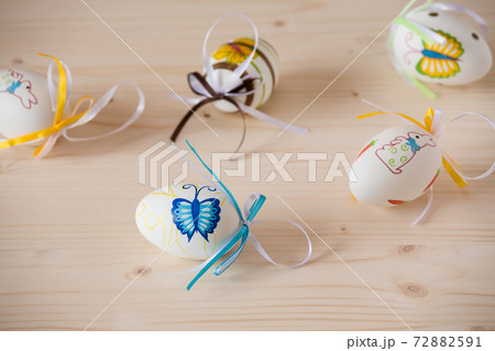 Easter eggs on wood background Easter eggs on wood background 72882591