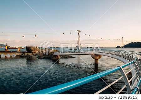 Songdo beach and walkway at sunset in Busan, Korea 72889515