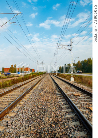 Two lane railroad with electric power lines Two lane railroad with electric power lines 72905035