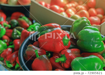 A new crop of natural vegetables. Ripe bell peppers close-up. 72905621