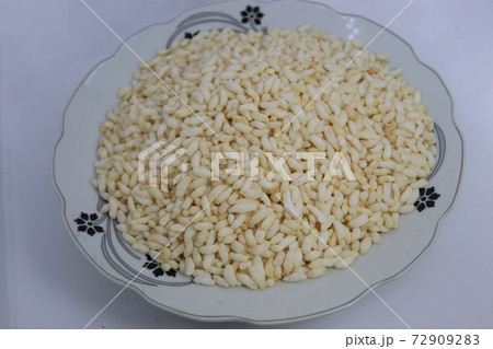 tasty and healthy puffed rice stock on plate 72909283