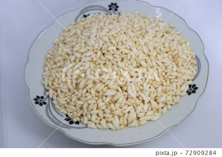 tasty and healthy puffed rice stock on plate 72909284