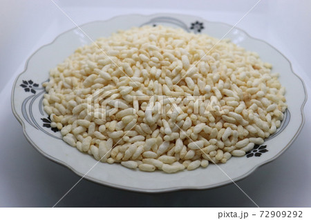 tasty and healthy puffed rice stock on plate 72909292