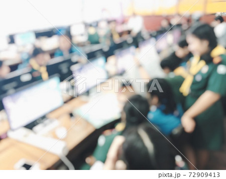 Education concept, blurred image of the student learning technology and workshop using computer together in computer room in secondary, university for study, Network communication, training concept. Education concept, blurred image of the student learning technology and workshop using computer together in computer room in secondary, university for study, Network communication, training concept. 72909413