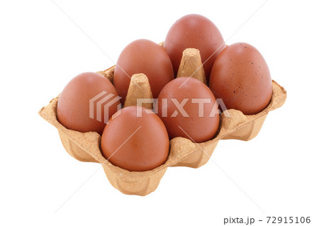 six brown eggs in carton on white with clipping path 72915106