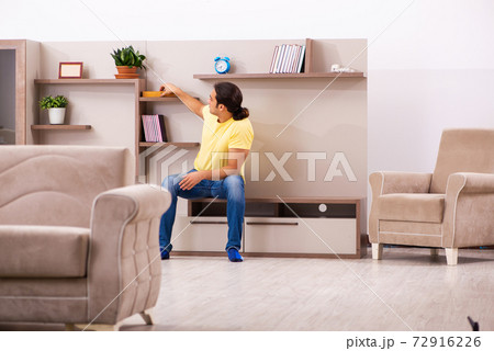 Young man student boring at home during pandemic 72916226