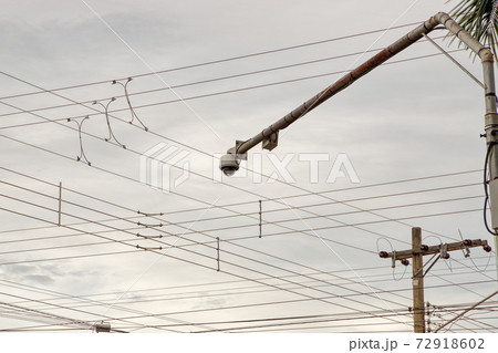 surveillance camera at the top of a pole surveillance camera at the top of a pole 72918602