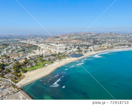 Aerial view of Dana Point Harbor town and beach. Aerial view of Dana Point Harbor town and beach. 72918710