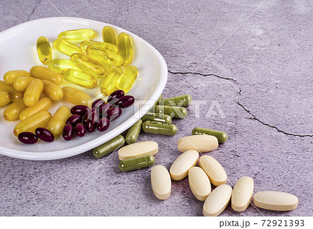 Evening primrose oil capsule,supplementary food on background Evening primrose oil capsule,supplementary food on background 72921393