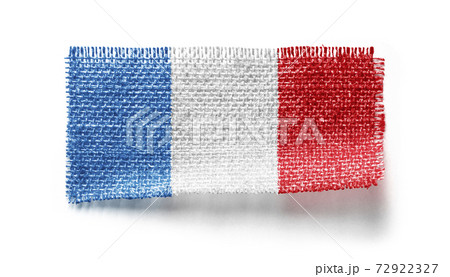 France flag on a piece of cloth on a white background 72922327