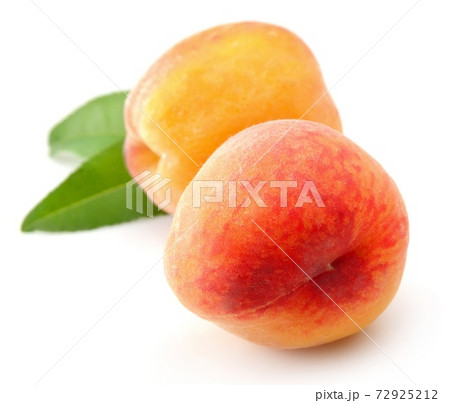 Peaches with leaves on white backgrounds. Peaches with leaves on white backgrounds. 72925212