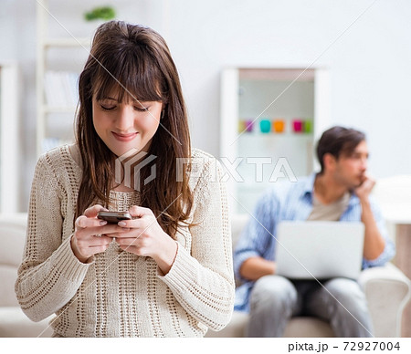 Couple cheating on each other at home Couple cheating on each other at home 72927004