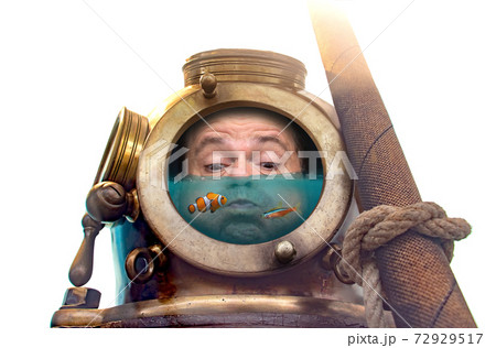 Portrait of man in old diving suit and helmet under water. Portrait of man in old diving suit and helmet under water. 72929517