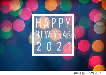 colorful holiday festive glittering defocused background with bokeh lights - Happy new year card 2021 72936342