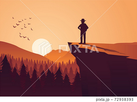 man take adventure in jungle,stand on cliff look to the sun in around with pine forest 72938393