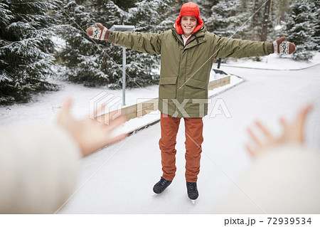 Man skating outdoors Man skating outdoors 72939534
