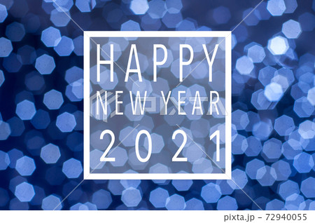 holiday festive glittering defocused blue background with bokeh lights - Happy new year 2021 card holiday festive glittering defocused blue background with bokeh lights - Happy new year 2021 card 72940055