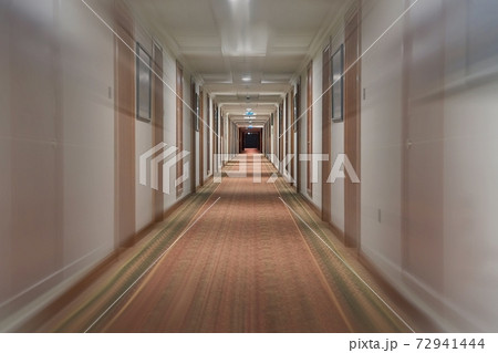 Corridor with with long line of doors Corridor with with long line of doors 72941444