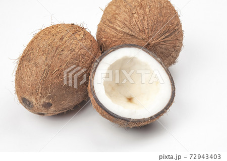 cut fresh coconut on a white background. vitamin fruits. healthy food 72943403