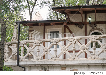 old house balcony. classic style house in a park. old house balcony. classic style house in a park. 72952444