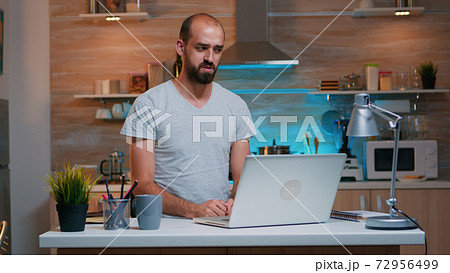 Man discussing on video call working from home 72956499