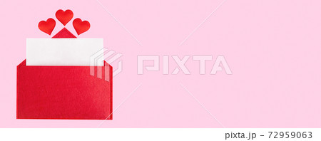 Banner red open envelope with a sheet of paper with a hearts on a pink background with mock-up. Valentines day holidays concept and love notes, christmas and new year letters for Santa Claus 72959063