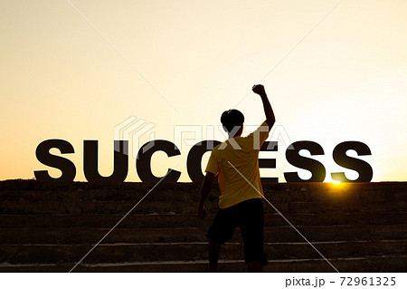 Young man stepping up the concrete stairs, Ambitions concept and Successful. Young man stepping up the concrete stairs, Ambitions concept and Successful. 72961325