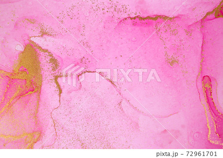 Alcohol ink pink and gold abstract stains background. Drops watercolor transparent texture. Alcohol ink pink and gold abstract stains background. Drops watercolor transparent texture. 72961701