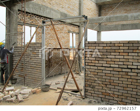 KUALA LUMPUR, MALAYSIA -MARCH 5, 2020: Mild Steel Door Frame at the construction site. Install by construction workers. More quality and durable compare to the wooden door frame. KUALA LUMPUR, MALAYSIA -MARCH 5, 2020: Mild Steel Door Frame at the construction site. Install by construction workers. More quality and durable compare to the wooden door frame. 72962157