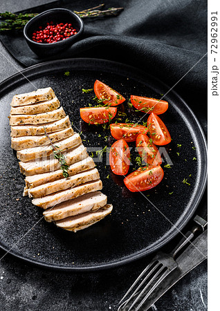 grilled chicken fillet with fresh salad. Healthy diet food. black background. Top view 72962991