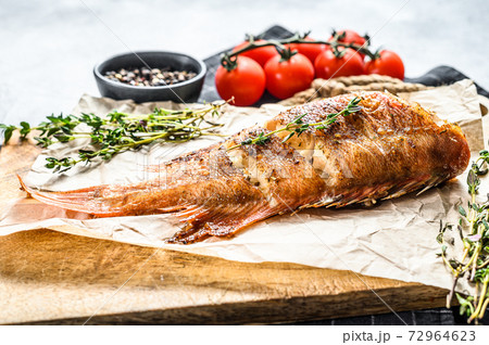 Red sea perch grilled. Gray background. Top view Red sea perch grilled. Gray background. Top view 72964623