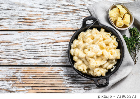 American mac and cheese, macaroni pasta in cheesy American mac and cheese, macaroni pasta in cheesy 72965573