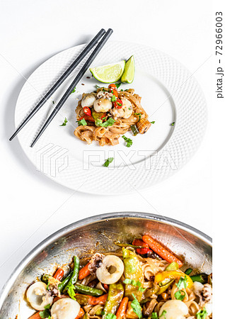 Wok with stir fry Udon noodles, seafood and 72966003
