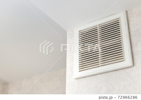 Dirty ventilation grille in the kitchen on the wall. Communication in the kitchen. 72966286
