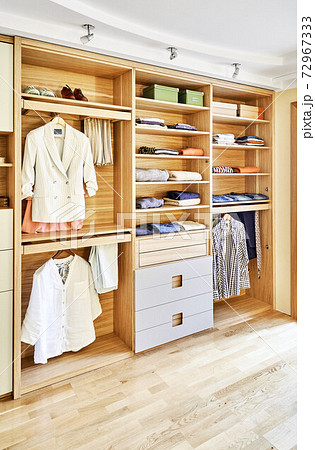 Modern wardrobe with finger pull design. Wooden wardrobe with