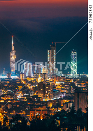 Batumi, Adjara, Georgia. Aerial View Of Urban Cityscape At Sunset. Town At Evening Blue Hour time. City In Night Lights Illuminations 72969342