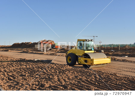 Soil Compactor the leveling soil at construction site.  72970947