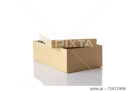 Mockup box paper. Brown cardboard carton package for shipping delivery isolated on white background. Closed craft paper object mockup for design. 72972906