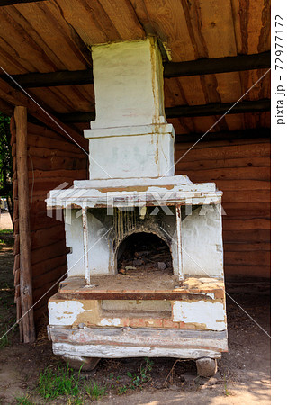 Traditional ukrainian ancient outdoor stove in the yard 72977172