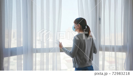asian woman is self quarantine asian woman is self quarantine 72983218